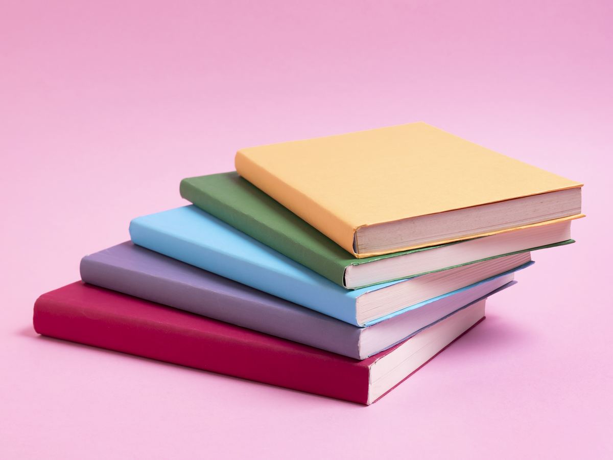 Stack of custom printed and bound corporate books